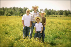 Keith, Clay, Cole and Carson in a field