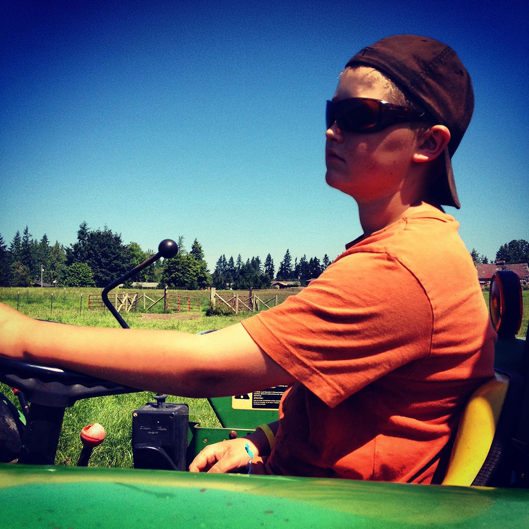 Clay Hickle driving a tractor