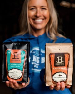 brook holding ranchers wife and ranch boss coffee bags