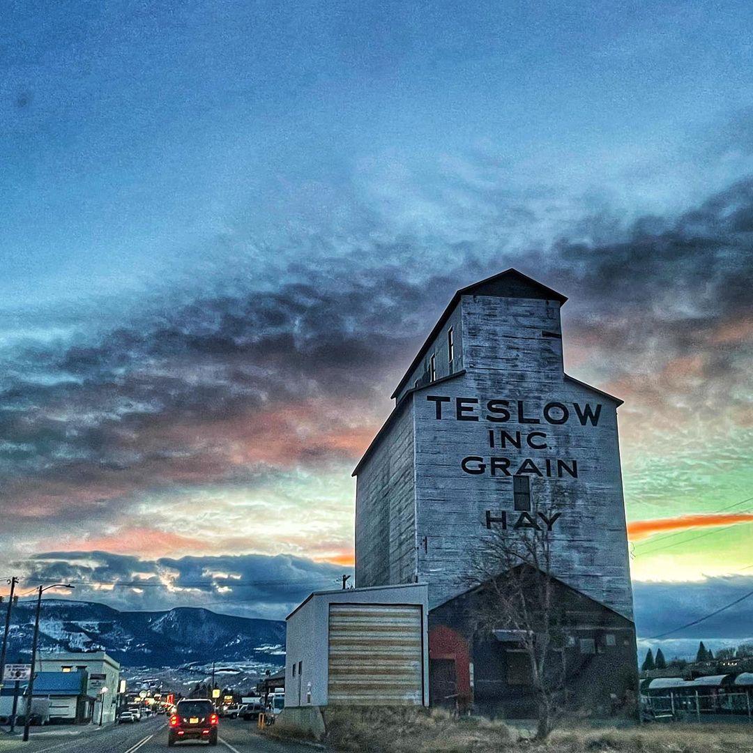 grain silo in Montana at sunset