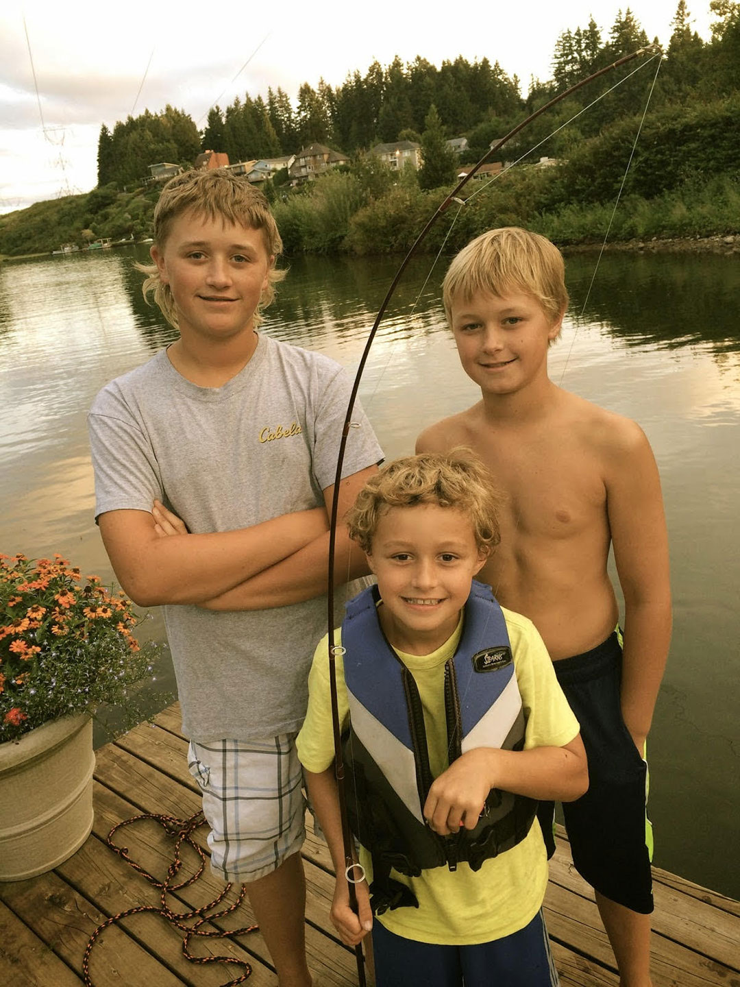 Clay, Cole, and Carson fishing at Lake Tapps